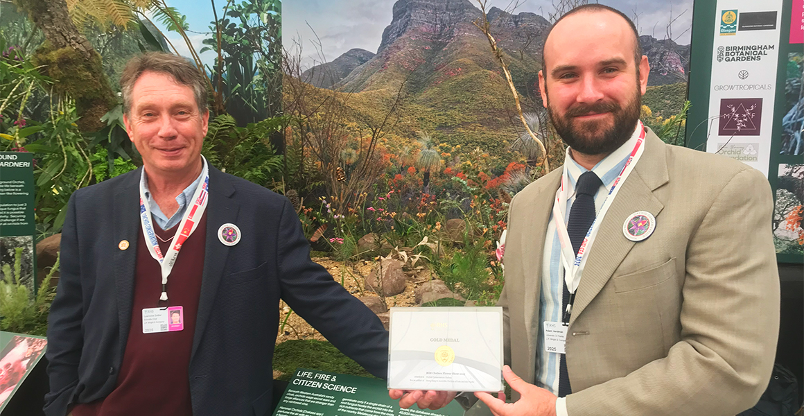 Adam Herdman, right, holds honor given at the Chelsea Flower Show, 2025