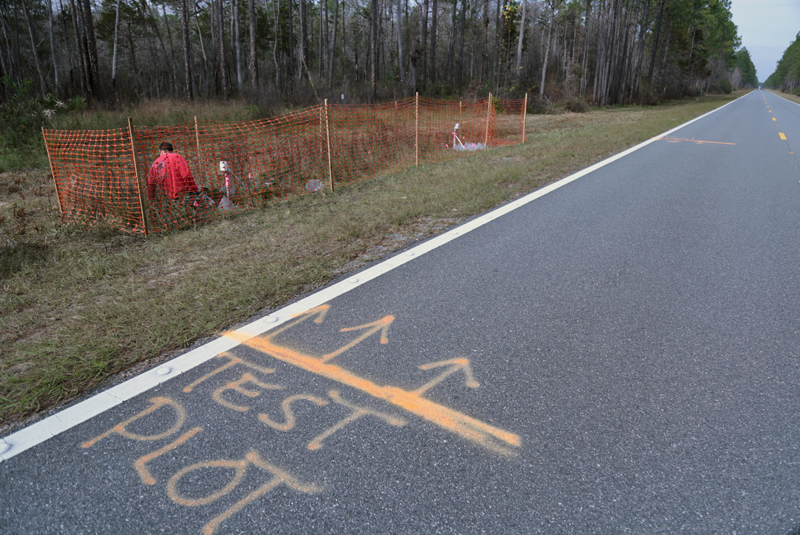 Taking precautions to make sure that roadside mowing crews avoid our experimental plots.